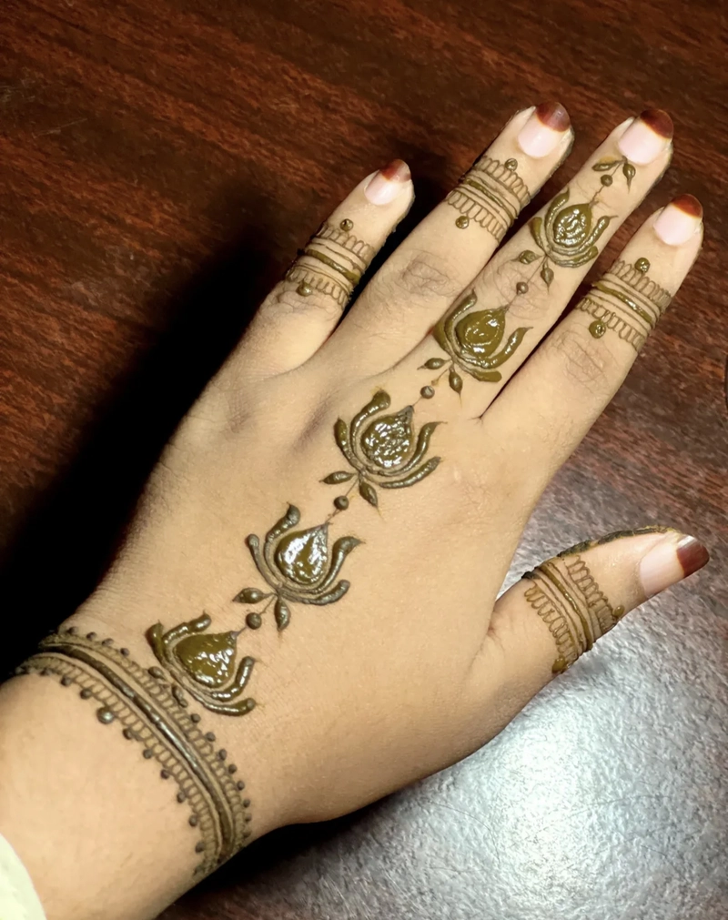 back hand lotus mehndi design