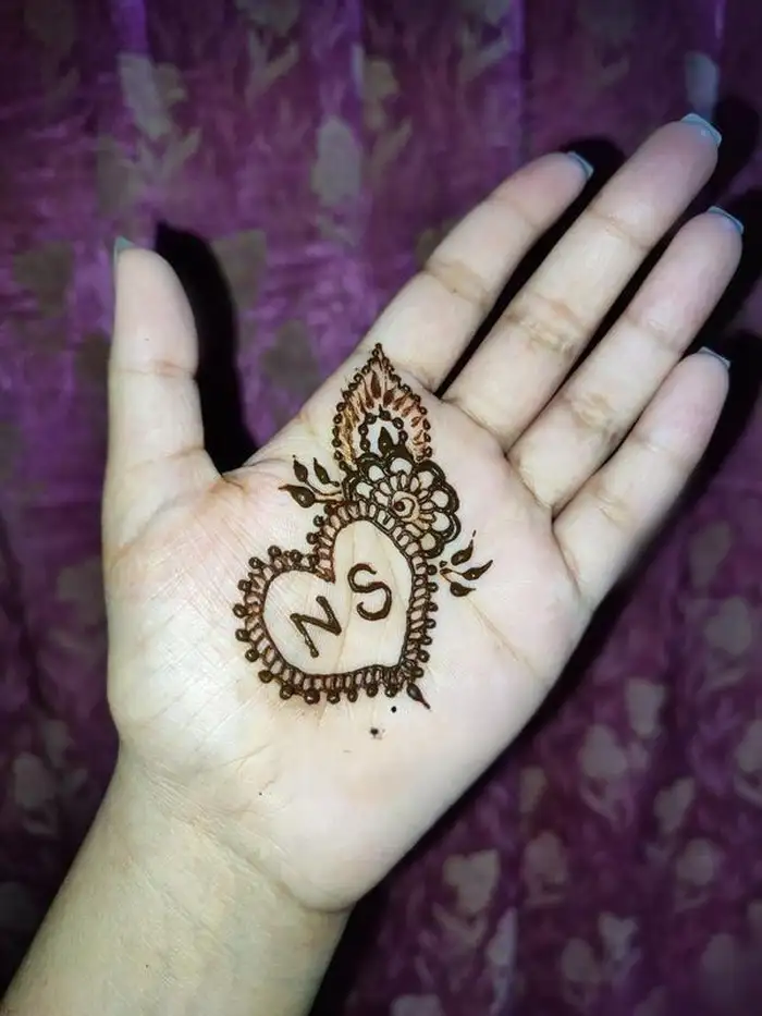 n letter mehndi design tattoo