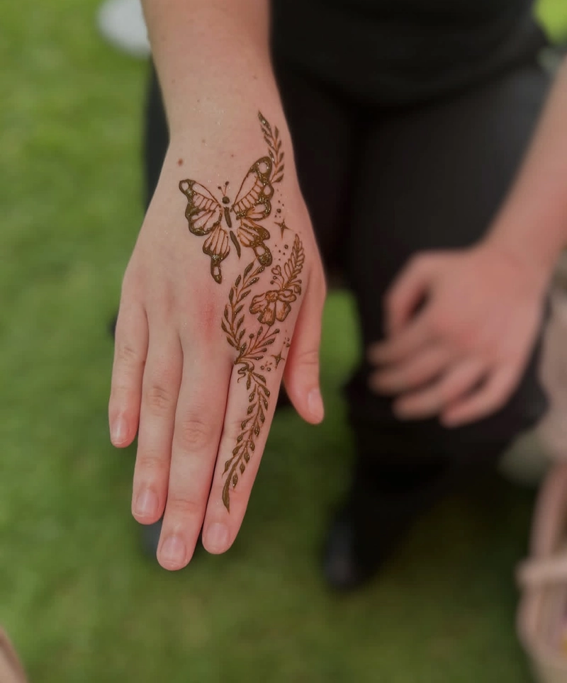 tattoo butterfly mehndi design