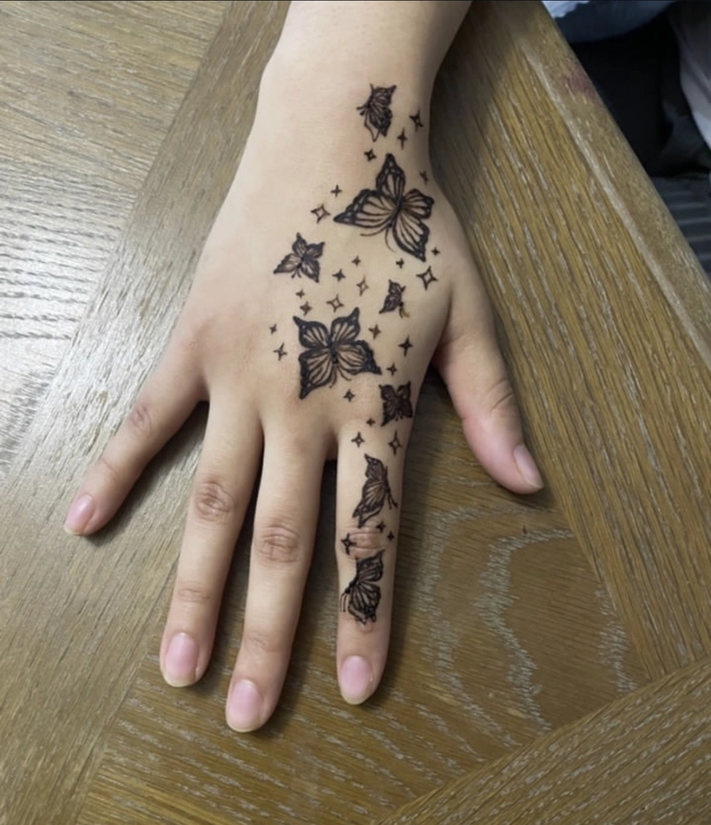 tattoo star butterfly mehndi design
