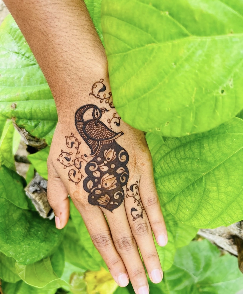back side peacock mehndi design