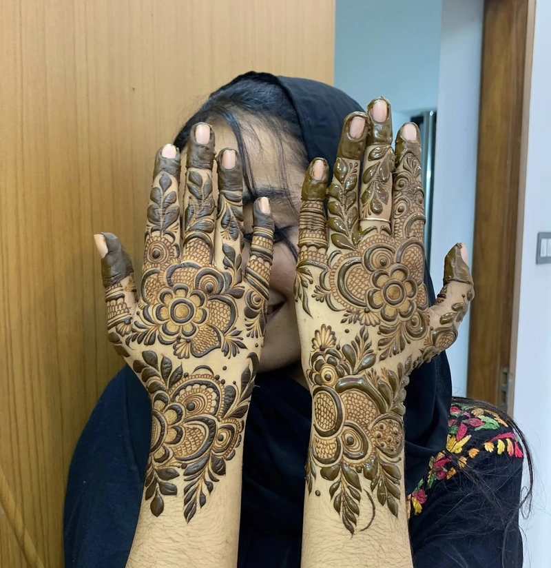 royal peacock mehndi design back hand