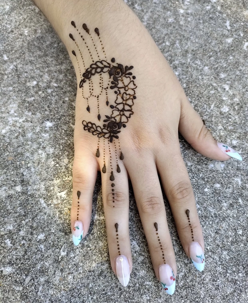 simple moon mehndi design back hand