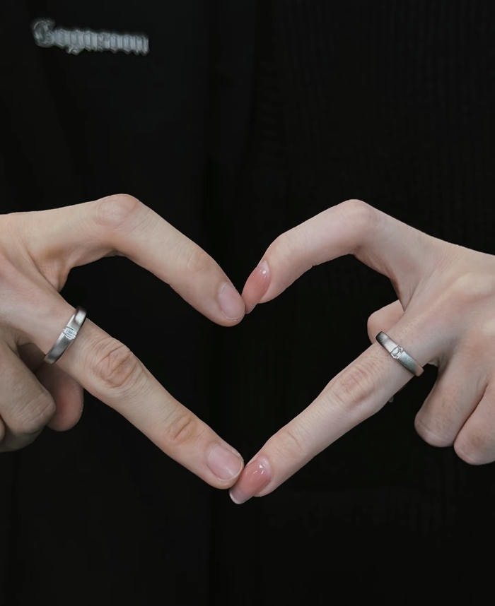 joined hands of couple